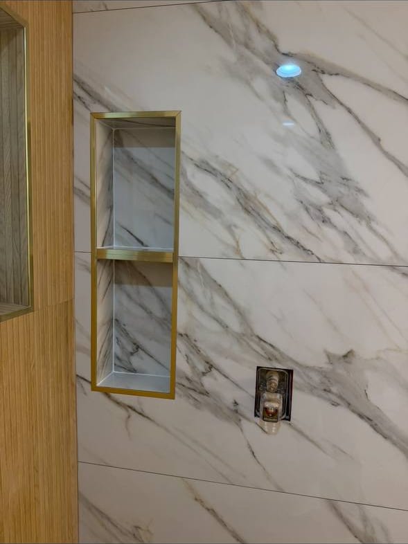Fluted Wood-Look Wall With Brass Trim
