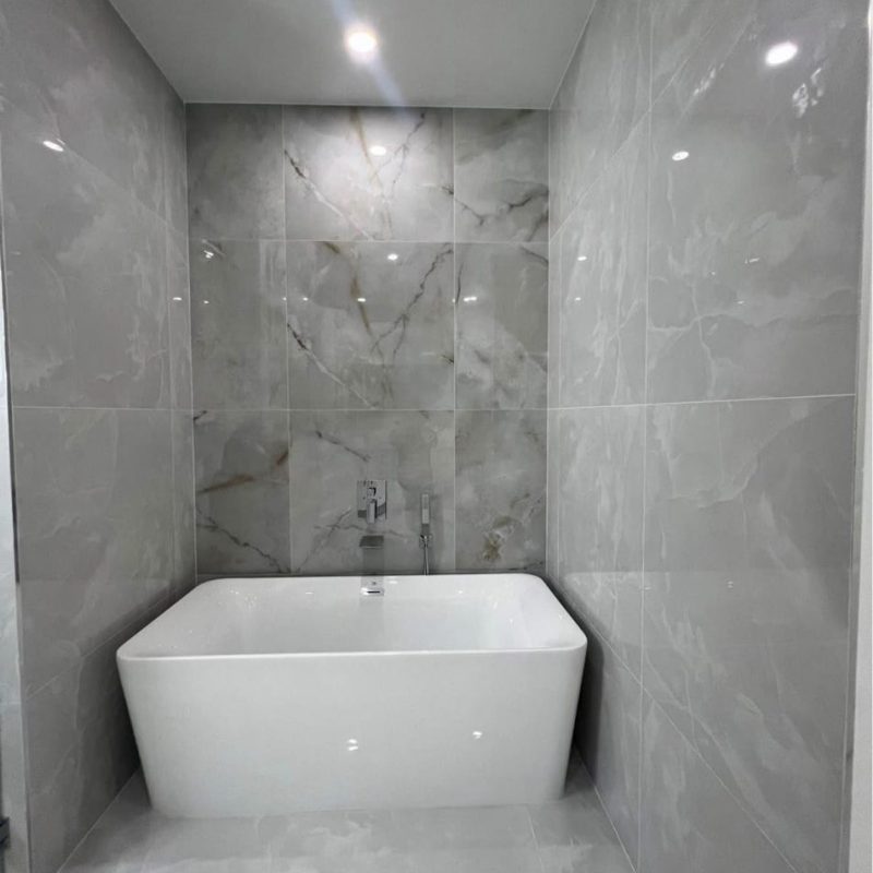 Large-Format Polished Porcelain Throughout a New Home